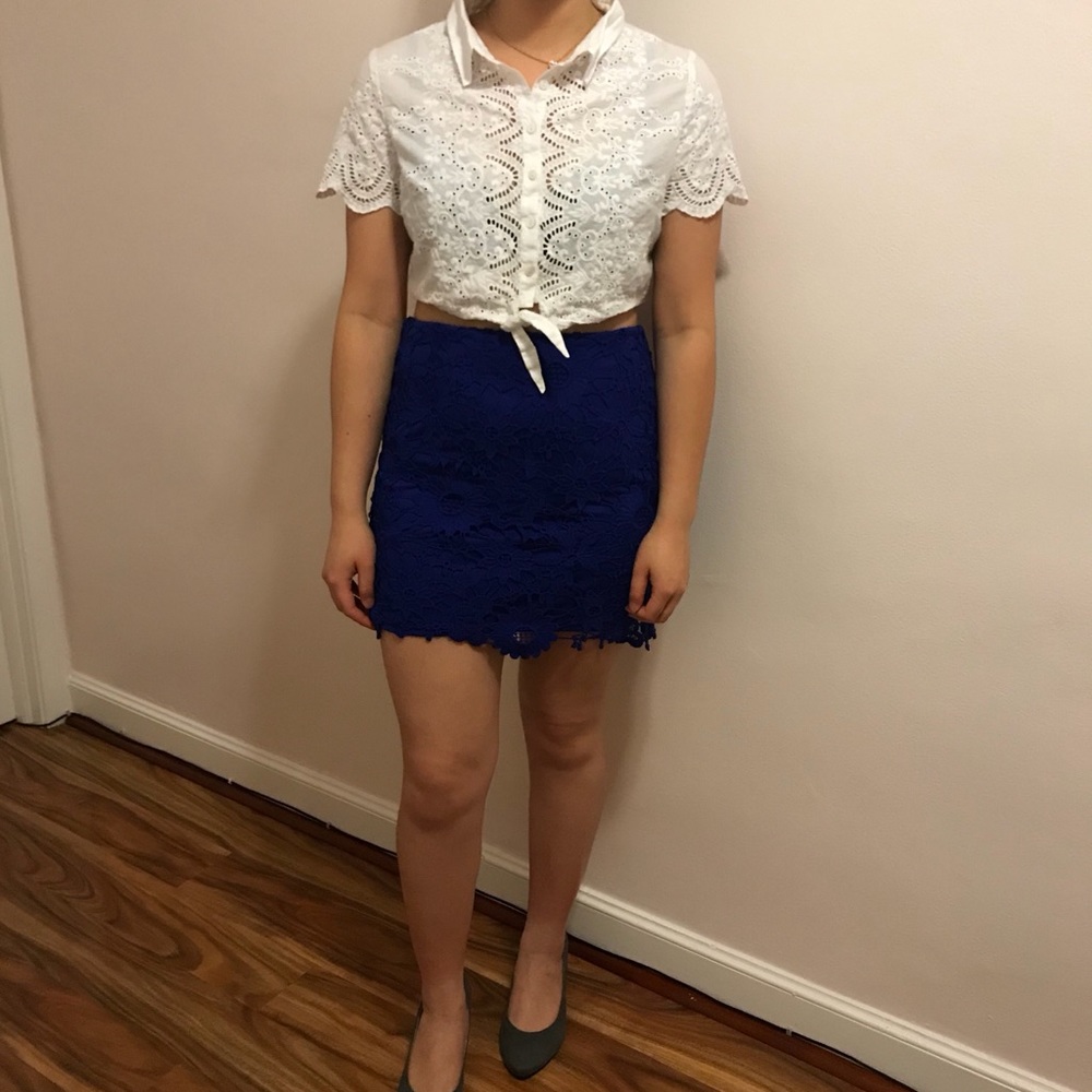 White top with blue skirt outfit